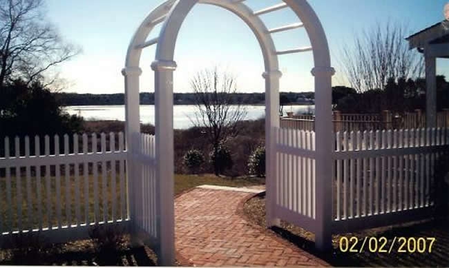 Vinyl Arbor with Vinyl Picket Fence overlooking the water -Arbor 5