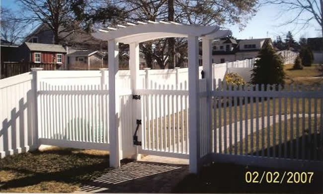 Pergola Curved Top Stepped Picket with Vinyl Board Fence in back -Pergola 2